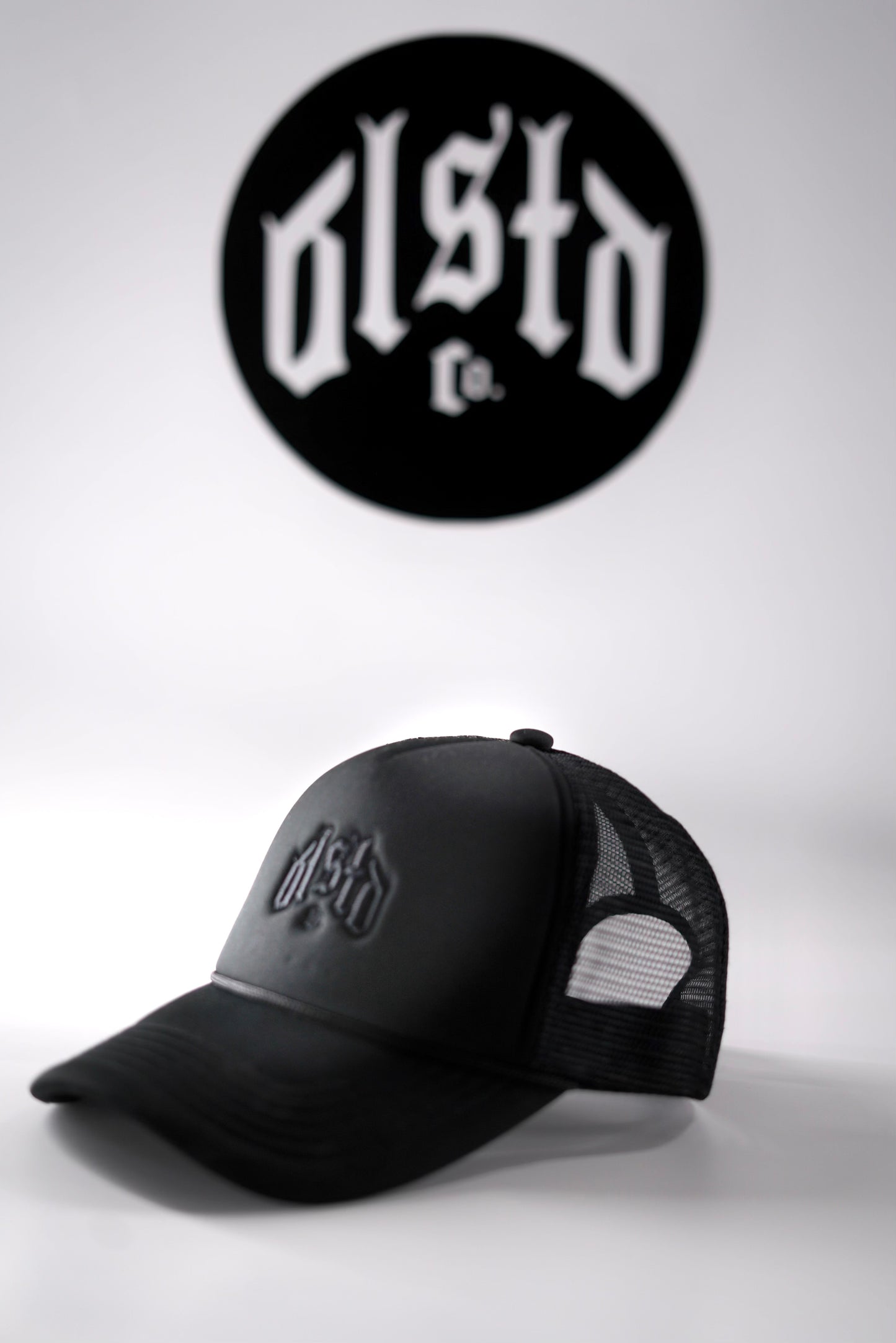 SOLID BLACK TRUCKER HAT